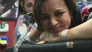 School Principal Gets Paul McCartney’s Autograph Tattooed On Her Back