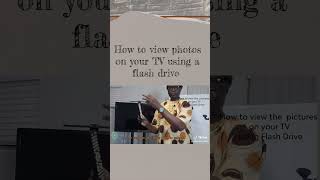 To view photos on your TV using a flash drive