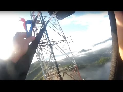 Friday Freakout: Sketchy BASE Jump + Miraculous Landing Through Fog, Across Power Lines & Over Trees