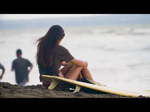 Free Video Clips And Footage - Girl sitting on the Beach