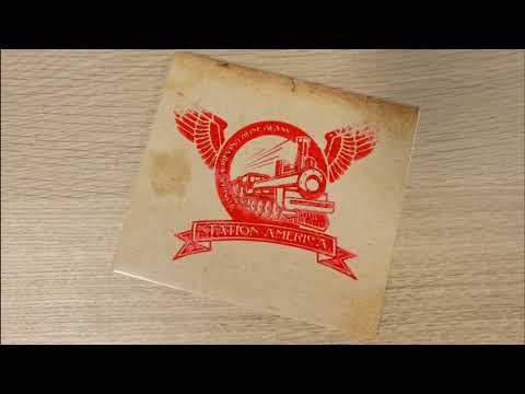 Station America - Op Bloeate Veut