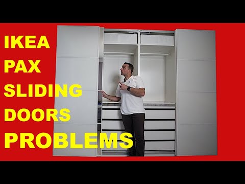 Part of a video titled How to fix Ikea pax sliding doors problems. - YouTube