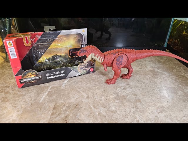 Vídeo relacionado con Mattel Jurassic World: El Renacer, Rugido salvaje Aucasaurio Juguete de dinosaurio, aucasaurio con ataque de mordisco en múltiples direcciones y sonido, controlados con la cola, juego digital, JGB88