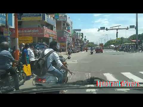 Idiots crossing with signal is red