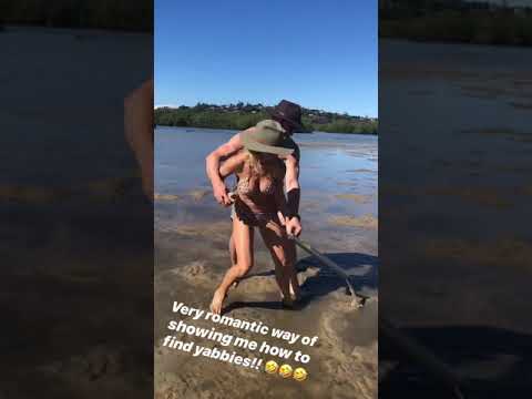 Chris Hemsworth and Elsa Pataky riding each others while finding yabbies