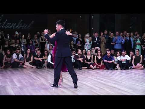  Roxana Suarez  and  Sebastian Achaval  are  dancing  to  the  tango  "  Volvamos a Empezar  "  by  Alfredo De Angelis  at  TanGO TO Istanbul  in  2020