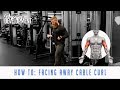 How to: Low Cable Curl [Facing Away] | PhysiqueDevelopment.com
