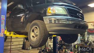 Replace metal transmission lines with rubber hose F150
