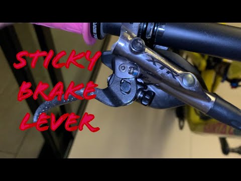 Shimano XTR M9020 sticky brake lever - titanium piston upgrade.