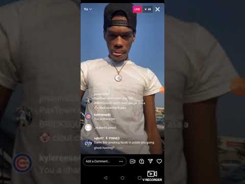 Fyndee Boyy waiting for opps at parking lot