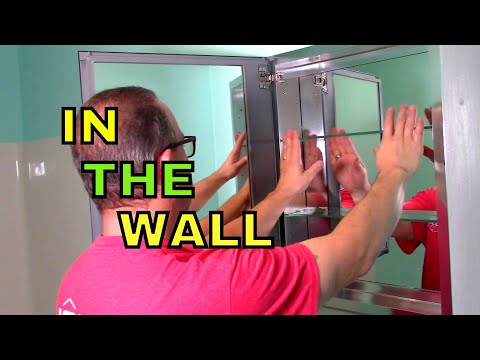 image-How do you install a recessed medicine cabinet between studs?