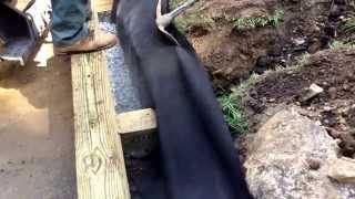 Landscape Networker | Tips and ideas on how to install a railroad tie retaining wall.