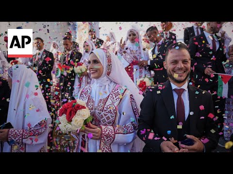 Mass wedding in Gaza celebrates new life after years of war and tragedy