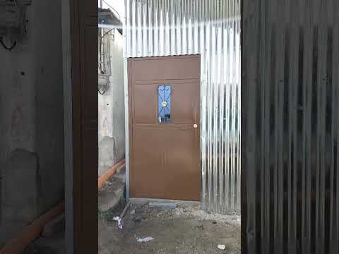 Trabajo terminado en Chiaj, San Antonio Ilotenango, Quiché. 2 puertas de metal y una persiana