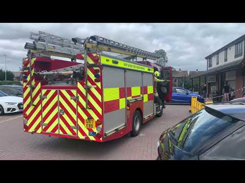 East Sussex fire and rescue service Eastbourne pump arriving at an Rtc car into building call