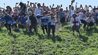 Großbritannien: jahrhundertealtes Käserennen in Brockworth lockt Fans aus ganz Europa