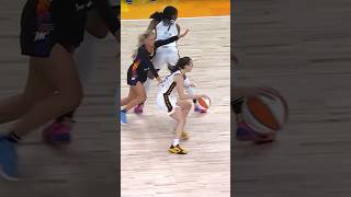 Caitlin Clark drives on Sophie Cunningham for the score