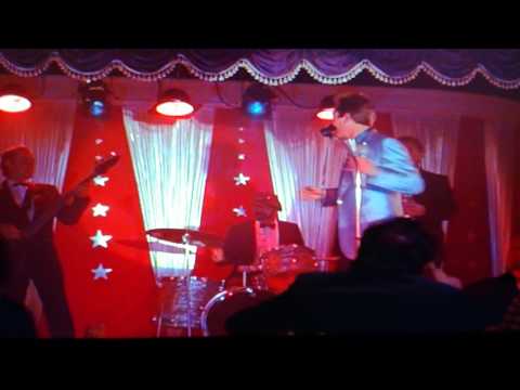 Christopher Walken sings.