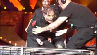 Slipknot's Corey Taylor falls hard on stage and staggers after crew help him up in Atlanta, GA