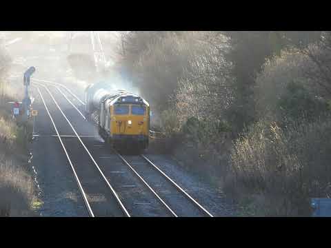 RHTT track cleaning train with 50050 passes through Flint Cymru/Wales on last 2018 run on 8.12.18