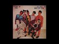 02  SPLIT ENZ 1976 walking down a road