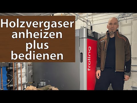 Heating a timber-framed house independently with firewood in a wood gasifier, Fröling SP Dual 40 ...