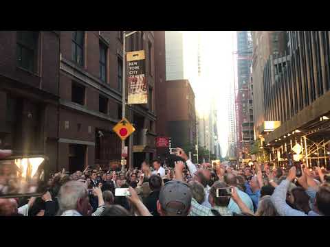 New York City - MCO (Millennial Choir and Orchestra) sing impromptu concert on street at Carnegie