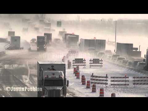 Blowing snow over Lake Butte Morts Bridge