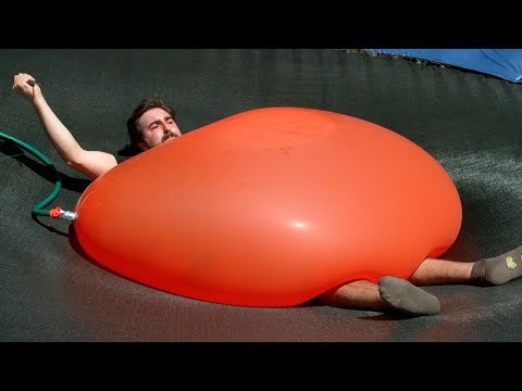 Crushed by a Giant 6ft Water Balloon - The Slow Mo Guys 4K