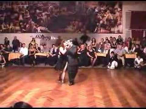 Vilma Fabiana Vega  and  Fernando Galera  are  dancing  to  the  milonga  "  Saca Chispas  "
