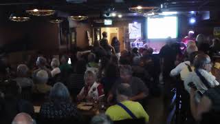 BUG! sings "It's Canada Day Up Canada Way" (Stompin' Tom Connors) led by Sue