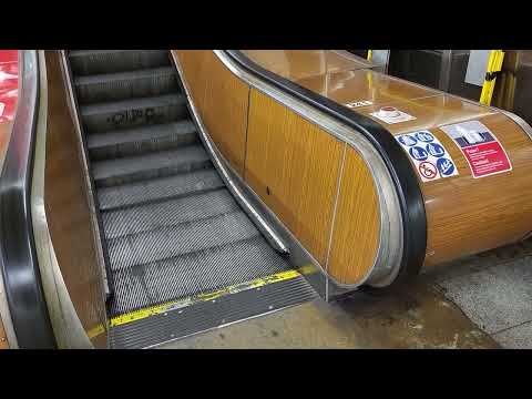 Soviet escalator at Můstek metro station (Prague), entrance at Palác Adria