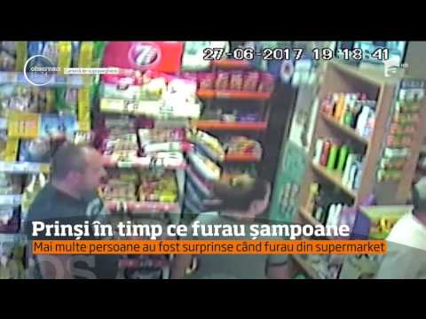 Prinși în timp ce furau şampoane din supermarket