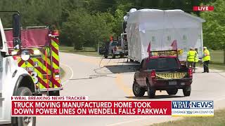 House on flatbed truck brings down powerlines, closing Wendell Falls Parkway