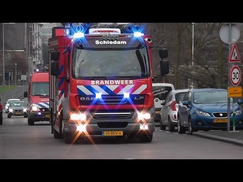 Brandweer Schiedam met TS 14-1 en WO 14-1 naar een Gebouwbrand in Rotterdam