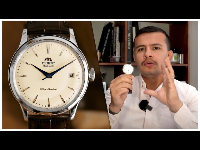 Vídeo relacionado con Orient Bambino - Reloj de Pulsera mecánico automático para Hombre con Correa de Cuero marrón y Caja de Acero Inoxidable con Pantalla analógica Amarilla - RA-AC0M04Y10B