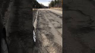 Horrible road pothole conditions on ST RT 244 Alfred NY