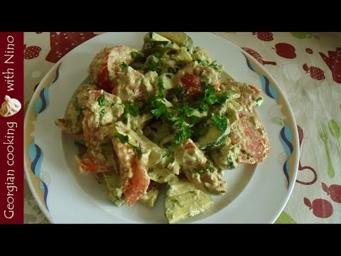 Cucumber and tomato salad with walnut pesto - Georgian recipe