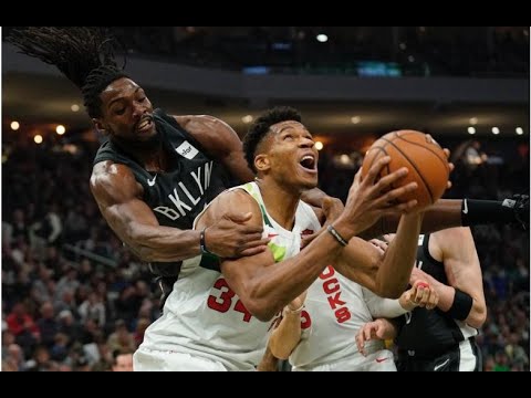 Giannis' triple-double helps Bucks turn away Nets