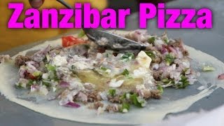 preview picture of video 'Zanzibar Pizza - Who invented this ridiculous combo?'