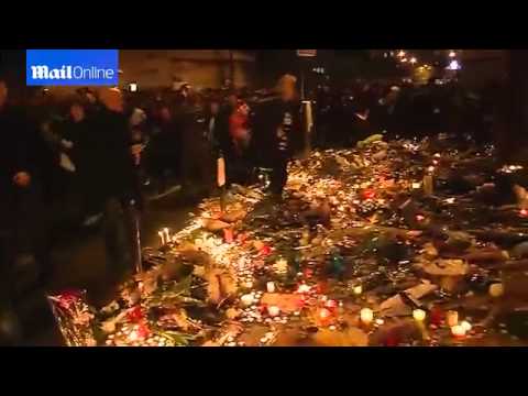 Panic in Paris people run screaming near shrine Le Carillon