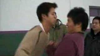 John Kisses Tommy During the Push Game