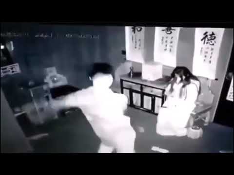 guy dancing in front of ghost