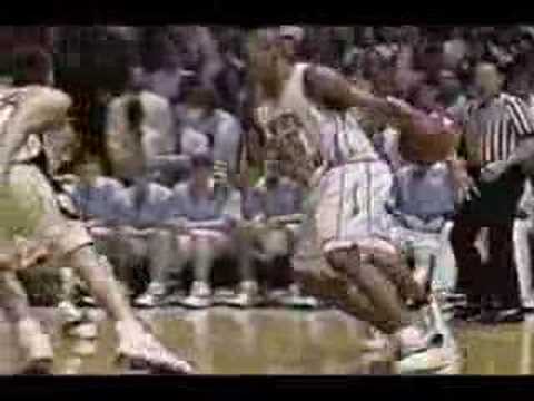 Vince Carter dunks on Tim Duncan