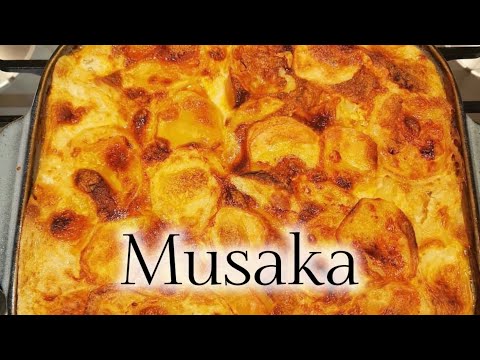 MUSAKA, potatoes dishes with minced meat and zucchini. Simple and delicious