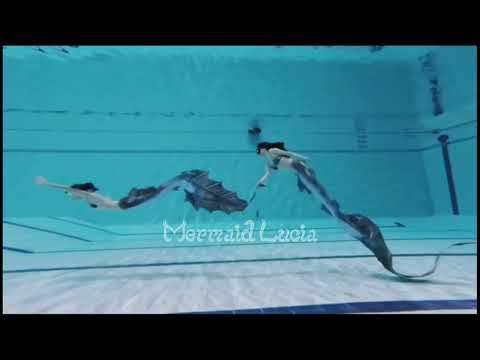 Two super-long dragon girls are dancing underwater 🐲🧜🏻‍♀️