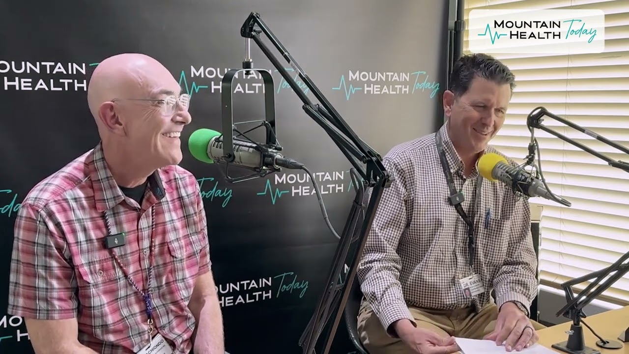 Dr. Brian Evans and Dr. Jim Nachiondo speaking into microphones in the Mountain Health Today podcast studio.
