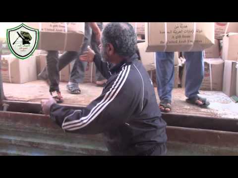 توزيع سلل إغاثية في بصر الحرير في محافظة درعا من قبل الفوج الاول مدفعية