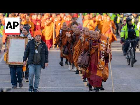 People travel to Washington to see Buddhist monks finish peace walk