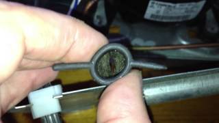 Fixing a Clogged Defrost Drain Check Valve in a Whirlpool-built Bottom-Mount Refrigerator